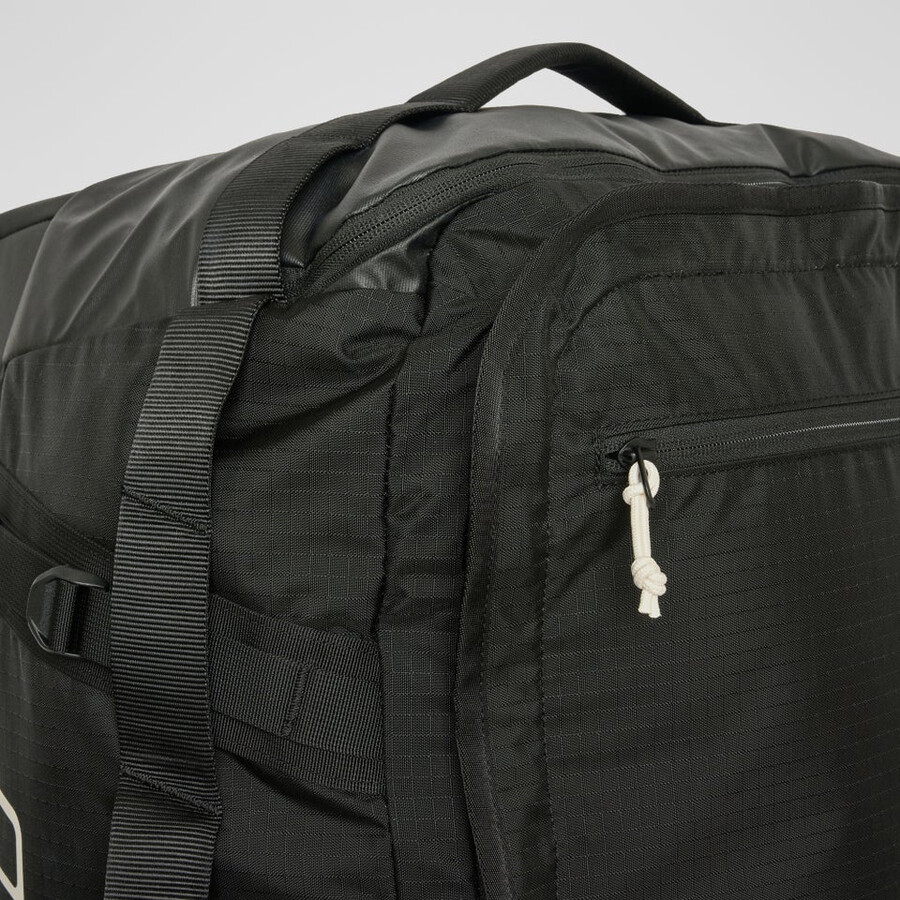 unisex xodus 100l wheeled bag - black die berghaus